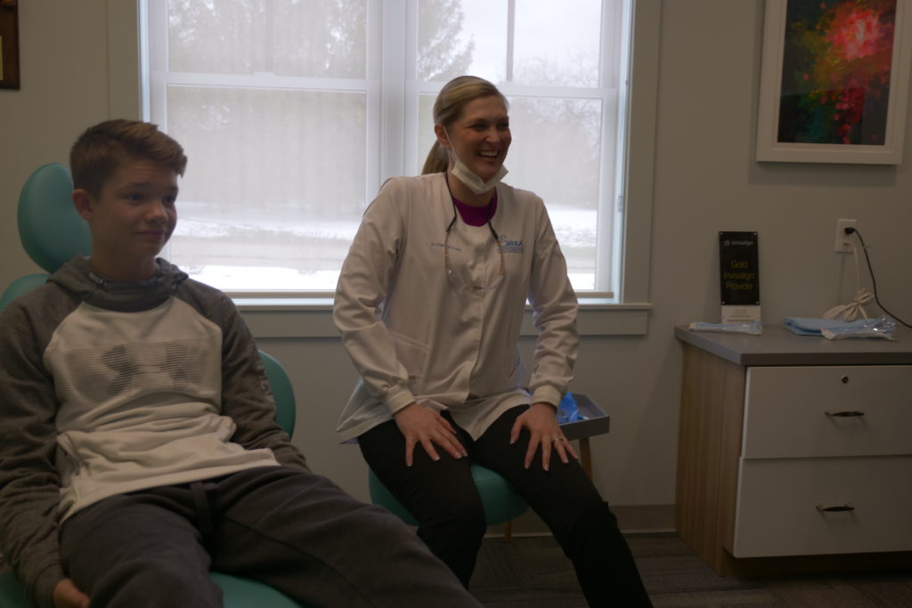 Dr. Swan with a patient