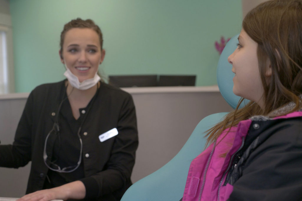 Swan staff talking to a patient